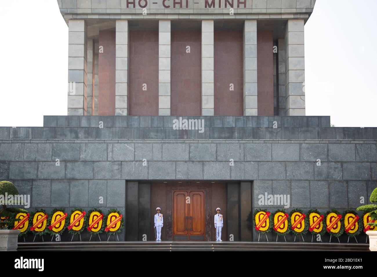 View of the front exterior of the Ho Chi Minh Mausoleum with Guards standing at the entrance. Stock Photo