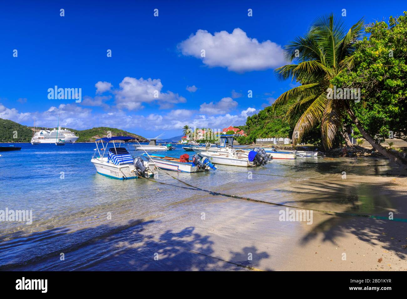 Les Saintes Bay at Anse Mire Cove beach, boats, turquoise sea, palm
