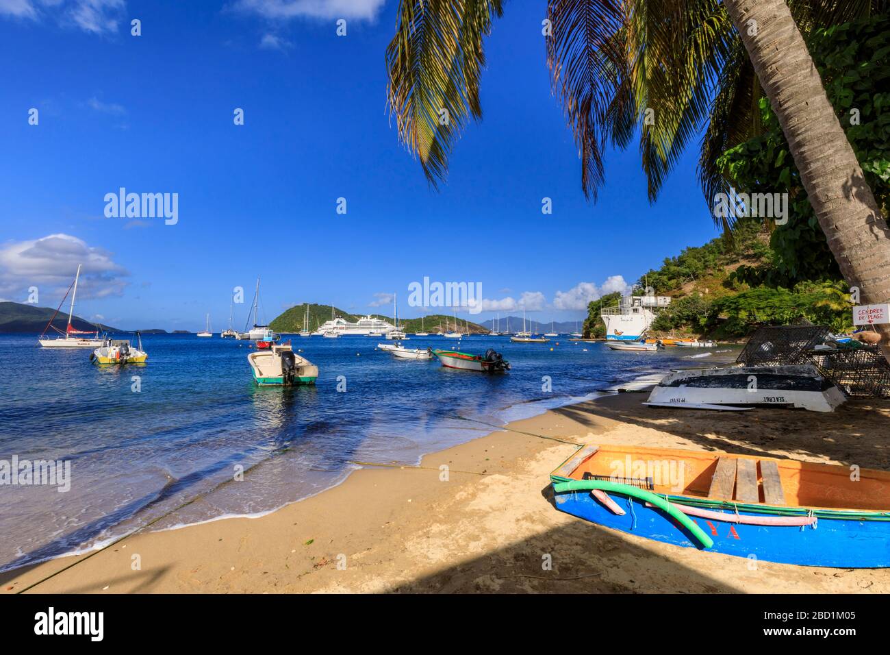 Colourful Anse du Bourg, town beach and boats, Terre de Haut, Iles Des