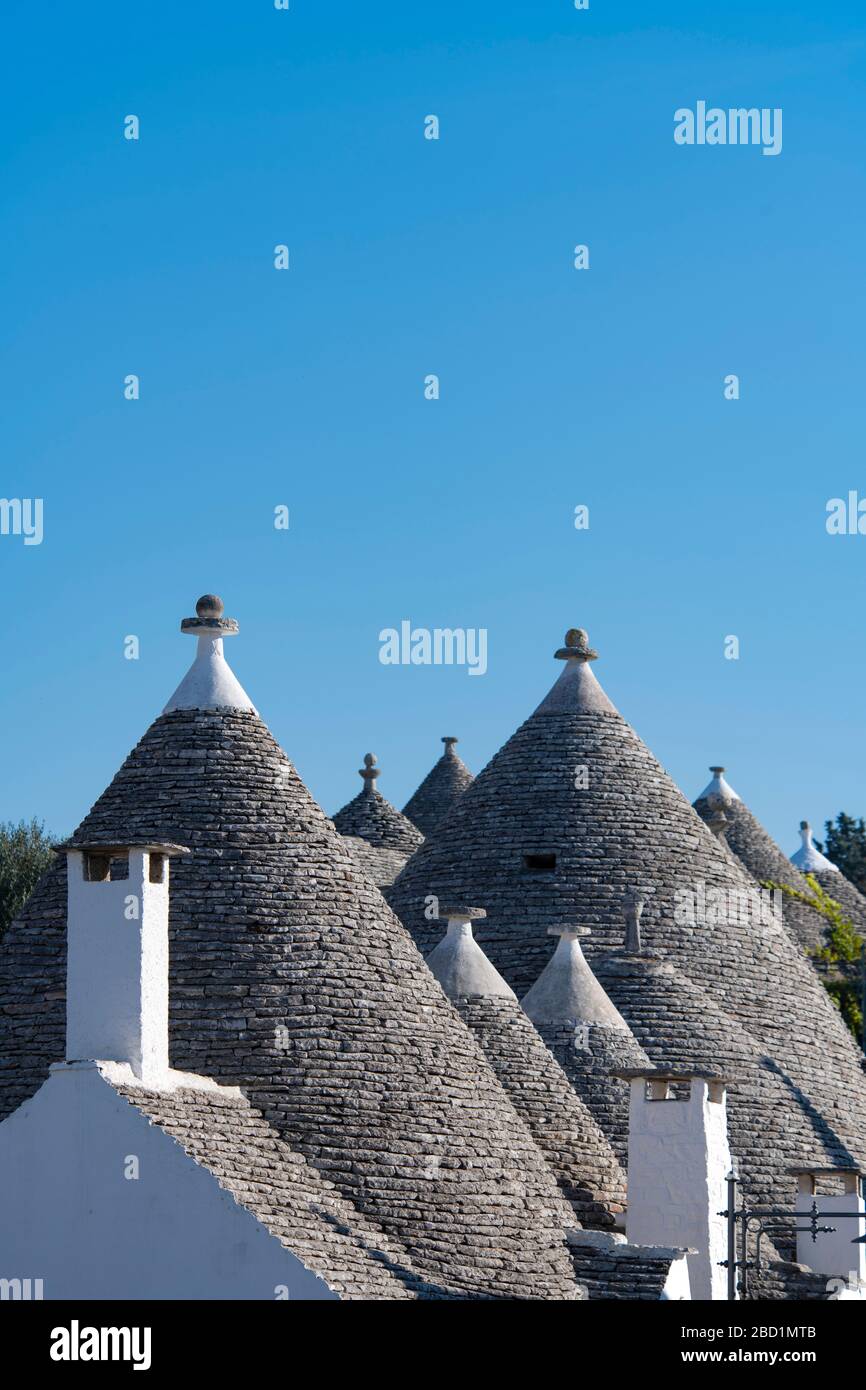 Conical dry stone roofs on traditioanl houses in Alberobello, UNESCO World Heritage Site, Bari Province, Puglia, Italy, Europe Stock Photo