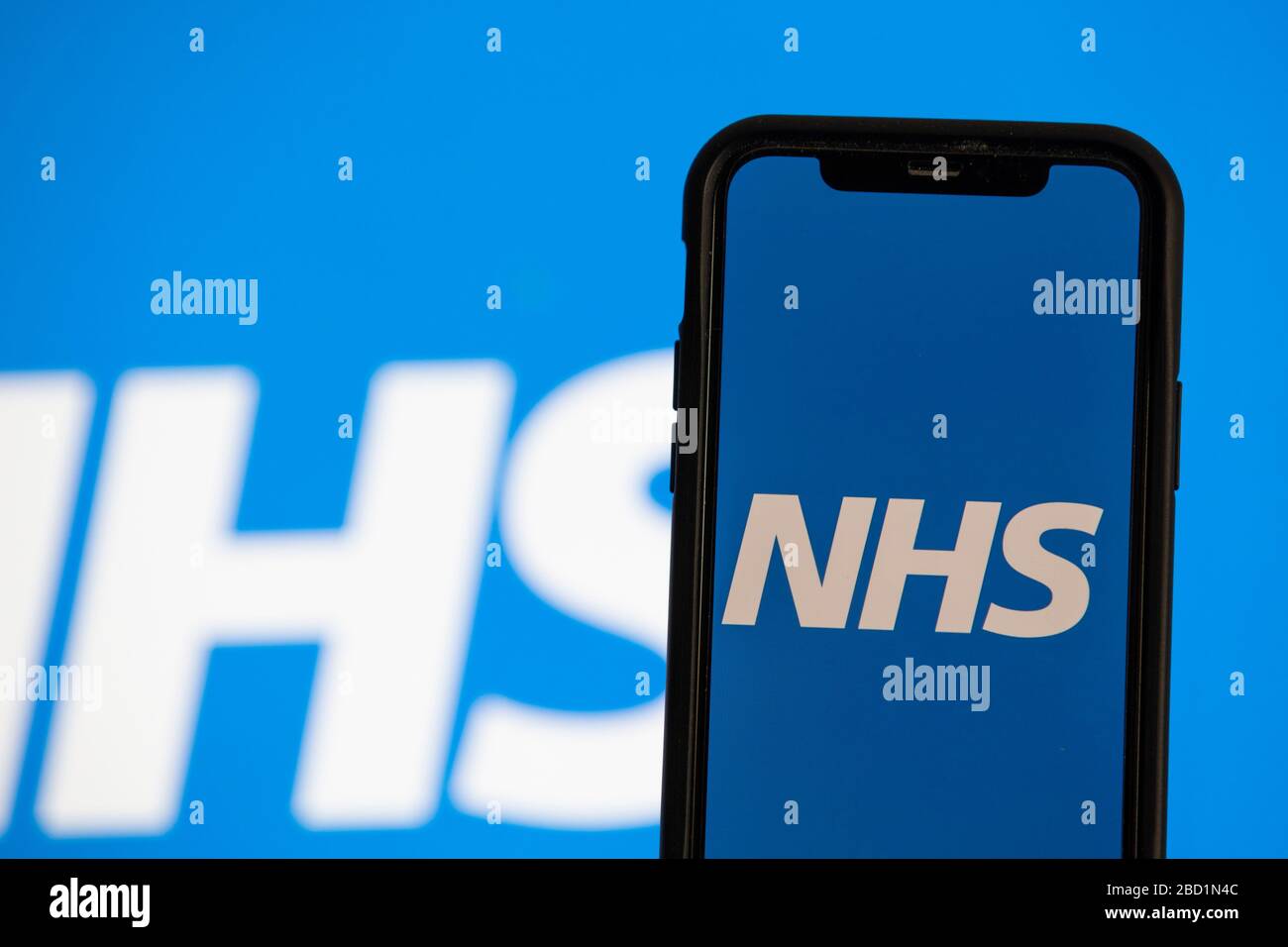 LONDON, UK - April 6th 2020: NHS National health service logo on a smartphone Stock Photo