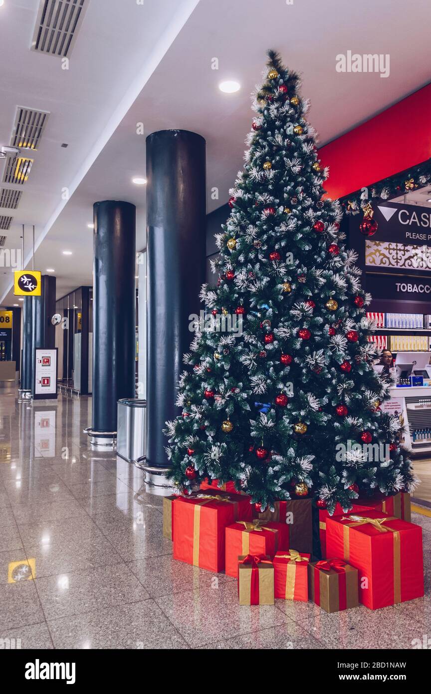 Nur-Sultan, Kazakhstan, 04 January, 2020: christmas tree and gift boxes decoration in the airport of Nur Sultan Stock Photo