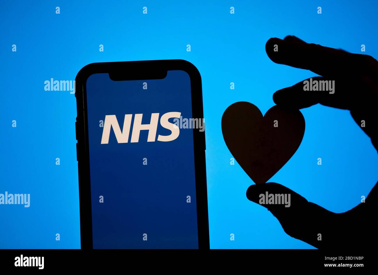 LONDON, UK - April 6th 2020: National health service logo with heart silhouette Stock Photo
