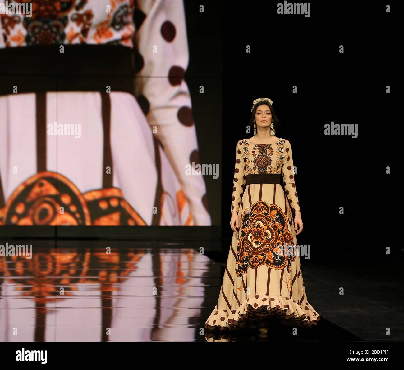 SEVILLA, SPAIN - JAN 30: Model Alicia Abril wearing a dress from the Eboli collection by designer Javier del Alamo as part of the SIMOF 2020 (Photo credit: Mickael Chavet) Stock Photo