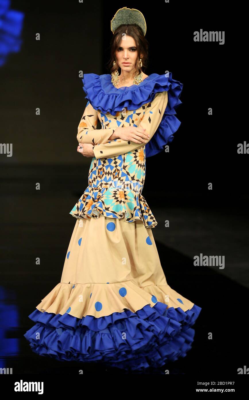SEVILLA, SPAIN - JAN 30: Model Martina Carrillo wearing a dress from the Eboli collection by designer Javier del Alamo as part of the SIMOF 2020 (Photo credit: Mickael Chavet) Stock Photo