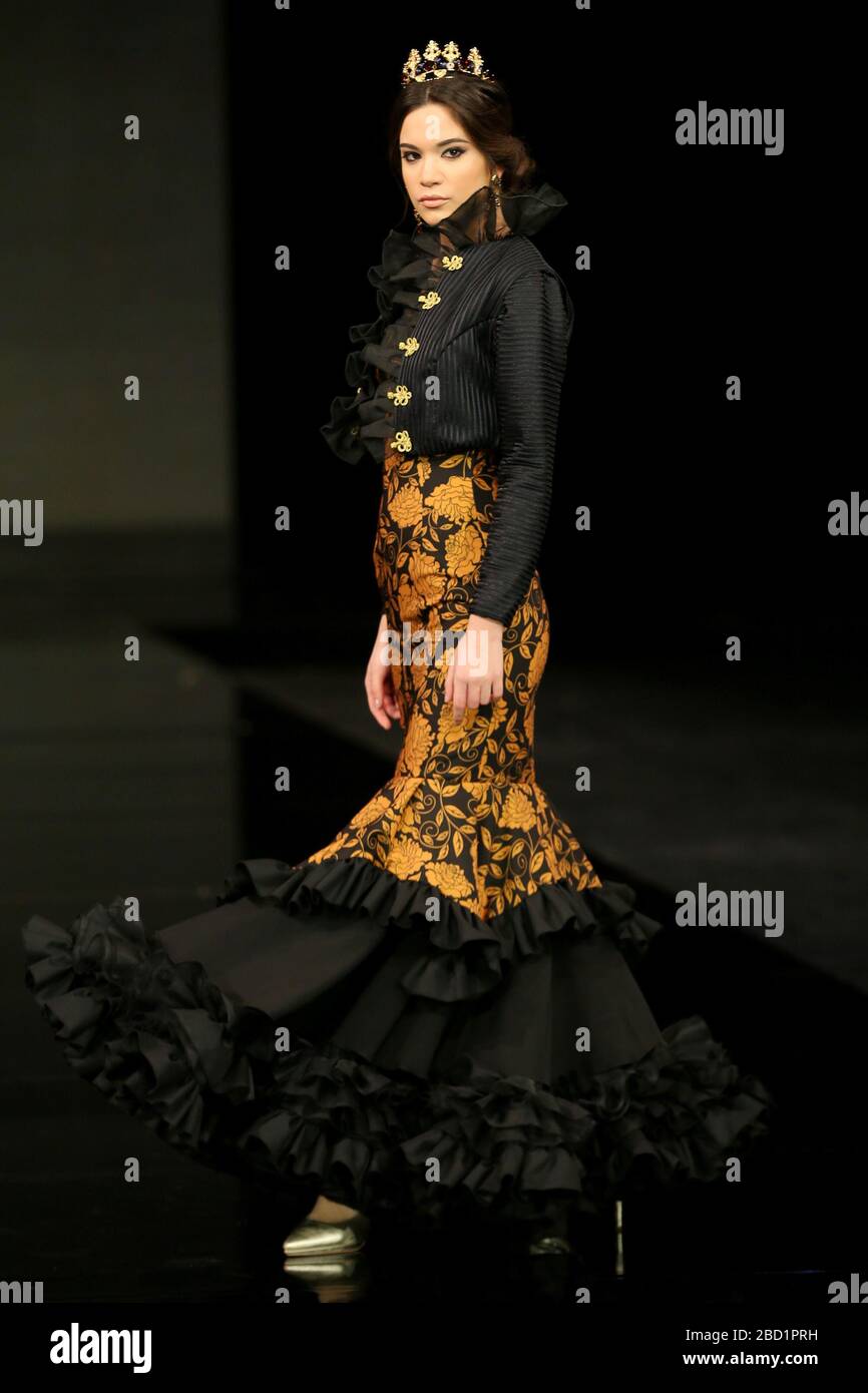 SEVILLA, SPAIN - JAN 30: Model wearing a dress from the Eboli collection by designer Javier del Alamo as part of the SIMOF 2020 (Photo credit: Mickael Chavet) Stock Photo