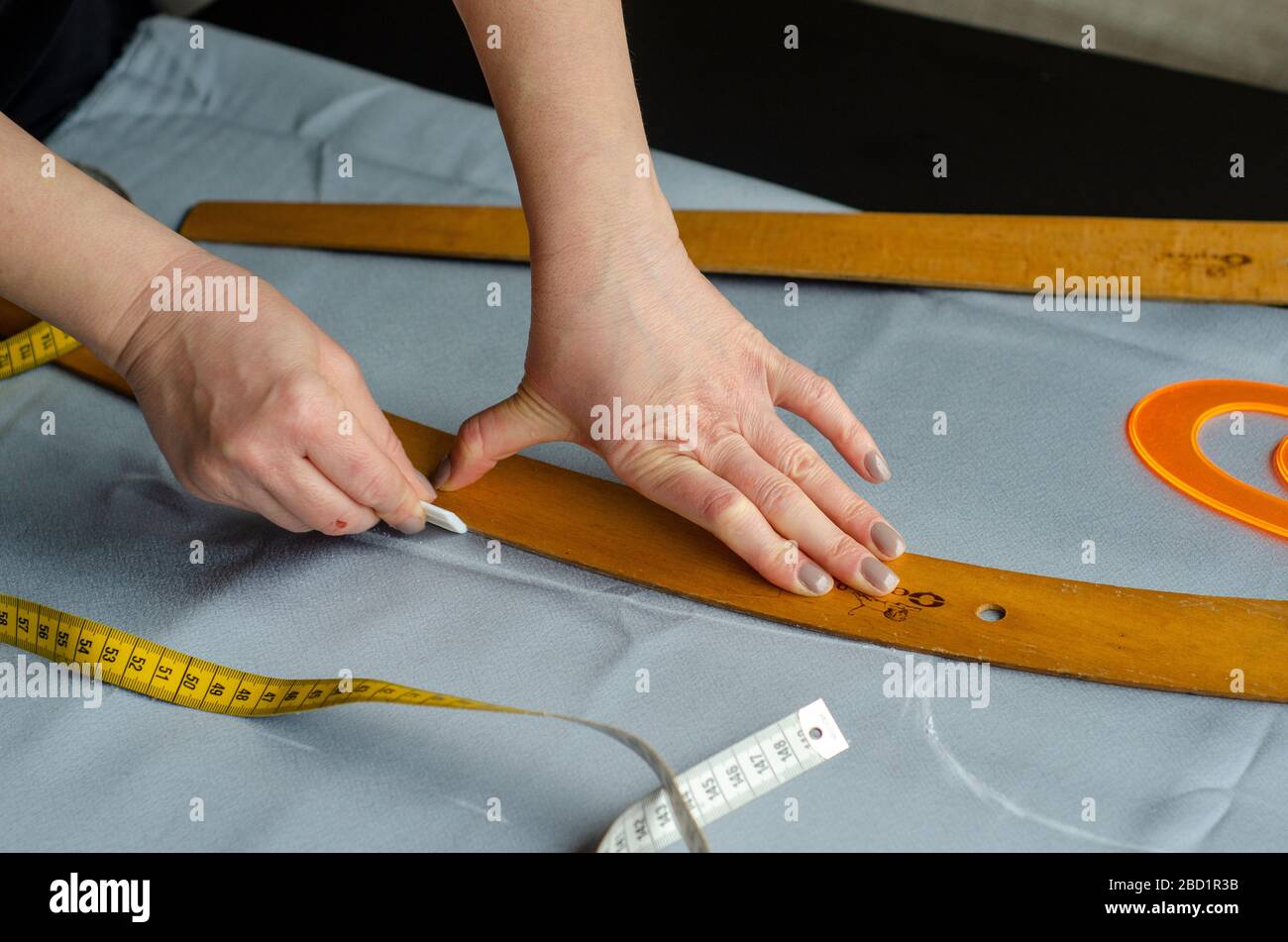 Woman scissors clothes alteration hires stock photography and images