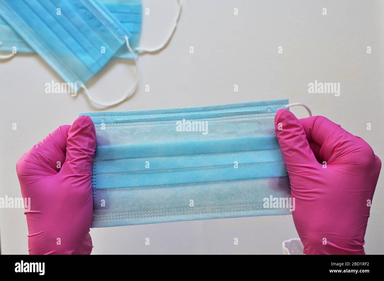 Nurse wearing surgical mask putting hi-res stock photography and images ...