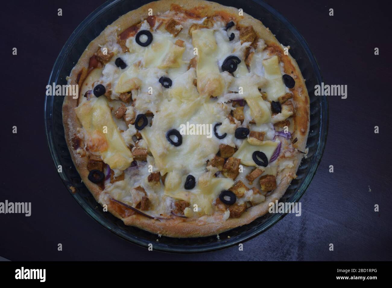 Delicious chicken cheese pizza with whole wheat dough and space to add text Stock Photo