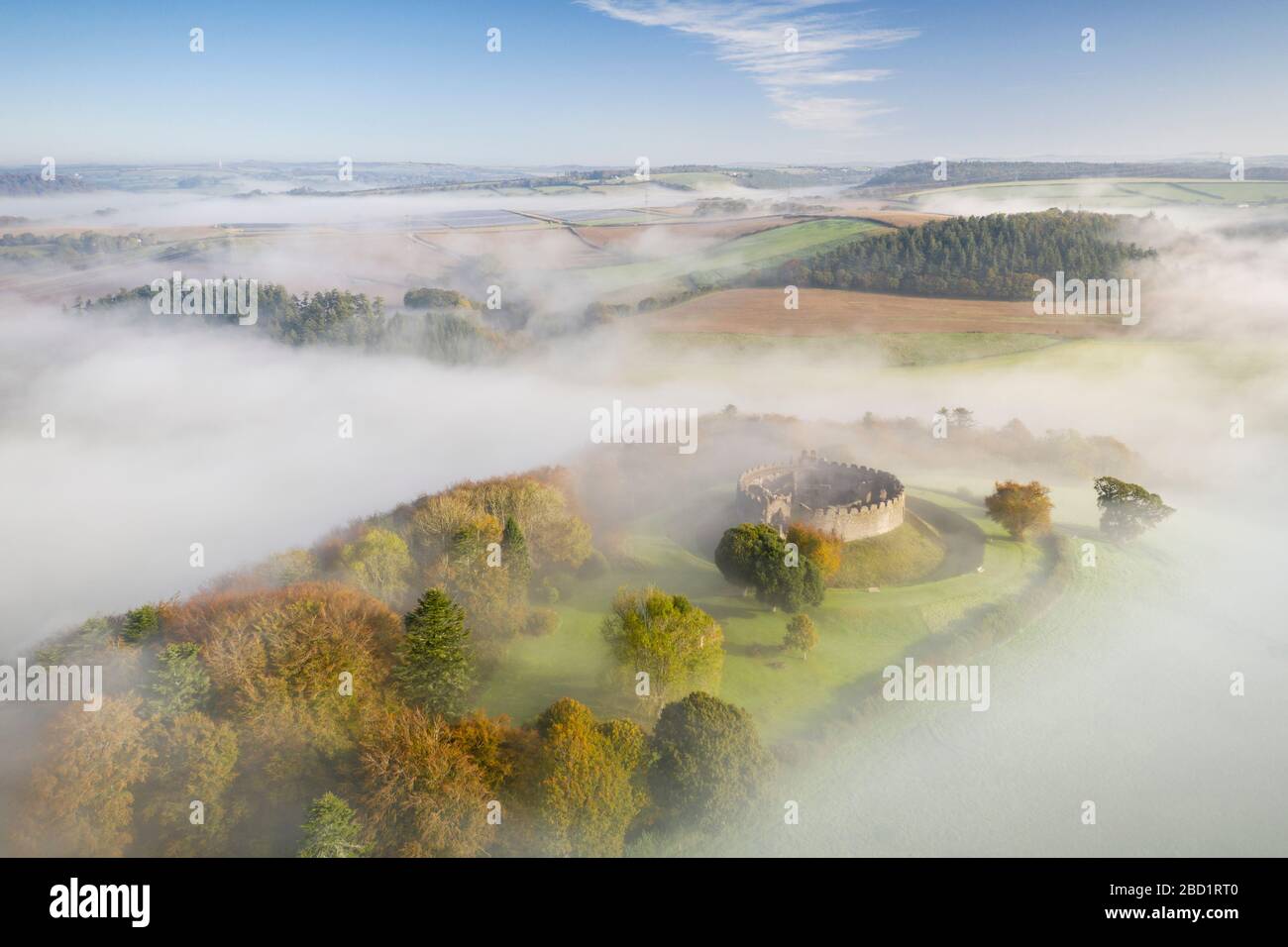 Aerial view by drone of Restormel Castle on a misty autumn morning, Lostwithiel, Cornwall, England, United Kingdom, Europe Stock Photo
