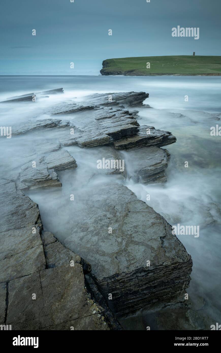 Dramatic rock ledges on the wild west coast of Orkney, Scotland, United ...
