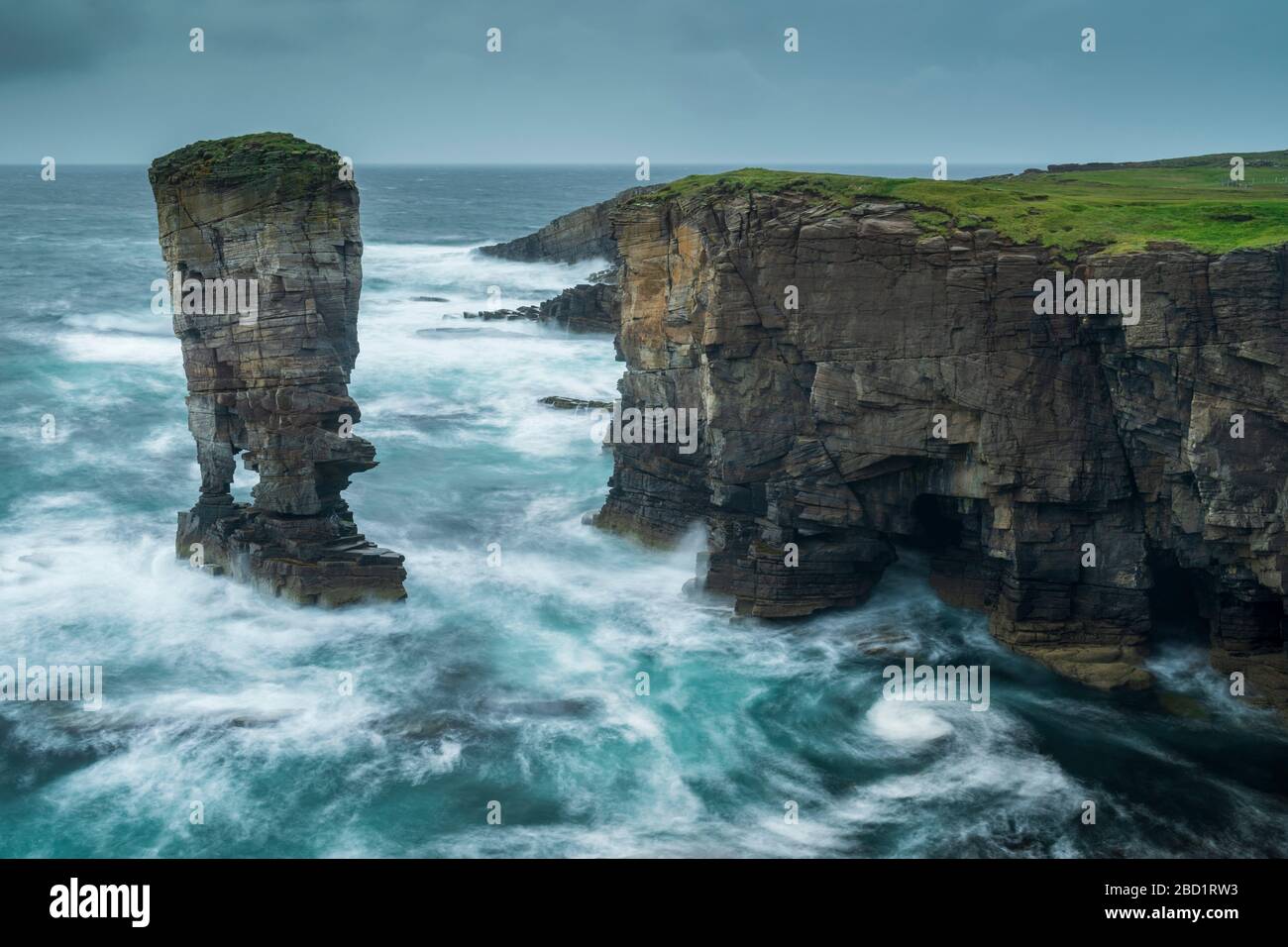 Yesnaby Castle sea stack and cliffs on the wild west coast of Orkney, Scotland, United Kingdom, Europe Stock Photo
