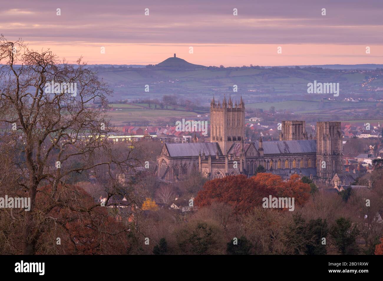 Wells Cathedral and Glastonbury Tor at dawn in winter, Wells, Somerset, England, United Kingdom, Europe Stock Photo