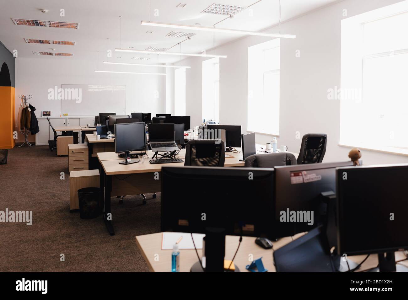 IT open space office. Computer Work Stations. Office Workplace with windows Stock Photo Alamy