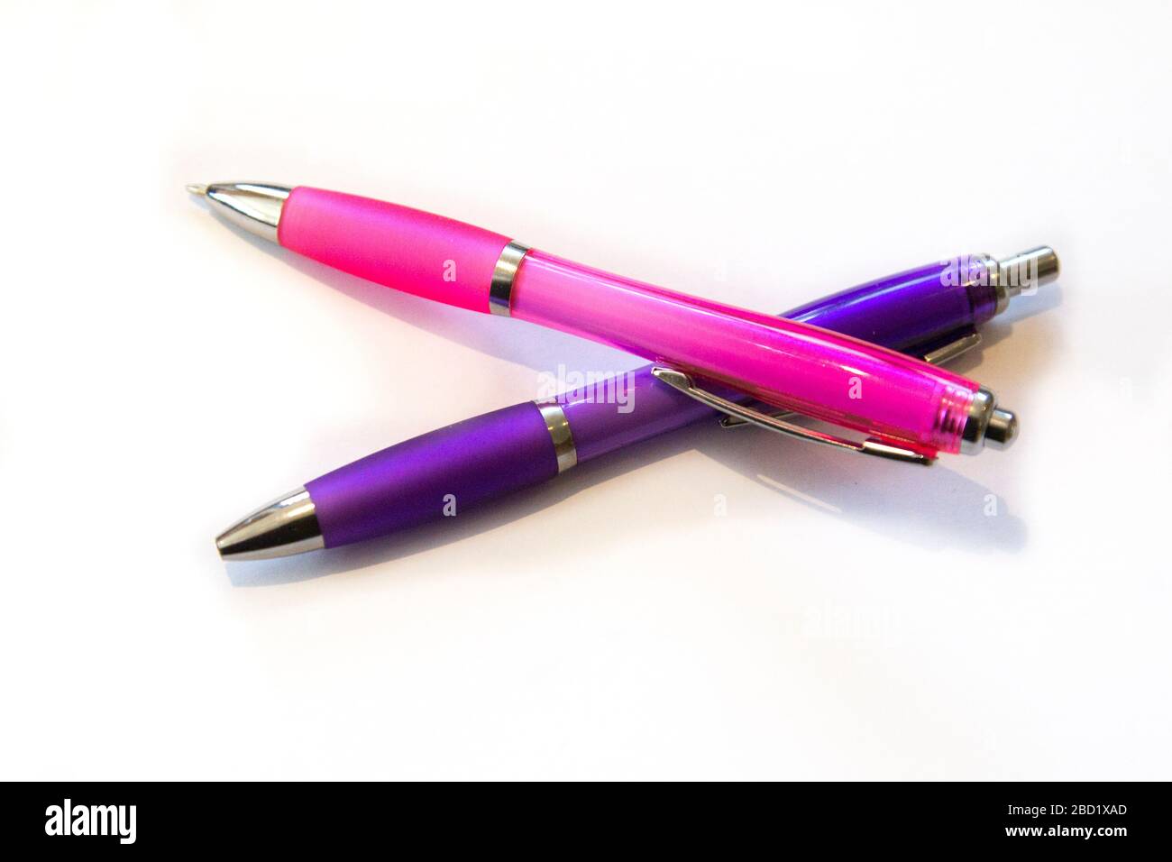 Brightly coloured pens on a white background Stock Photo