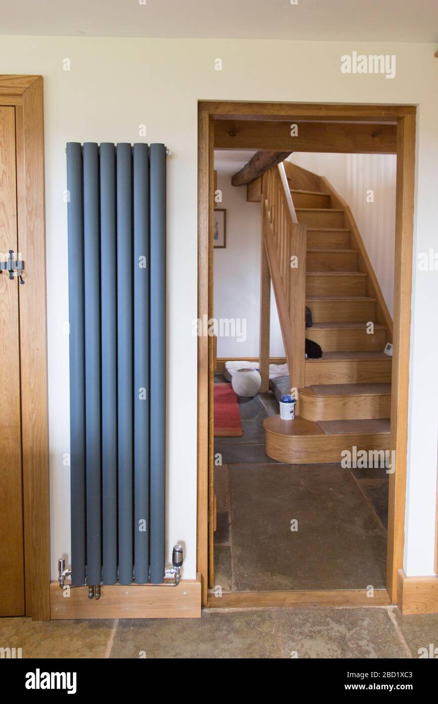 Vertical Radiator On Kitchen Wall Dark Grey Vertical Radiator In A   Vertical Radiator On Kitchen Wall Dark Grey Vertical Radiator In A Country Farmhouse Kitchen 2BD1XC3 