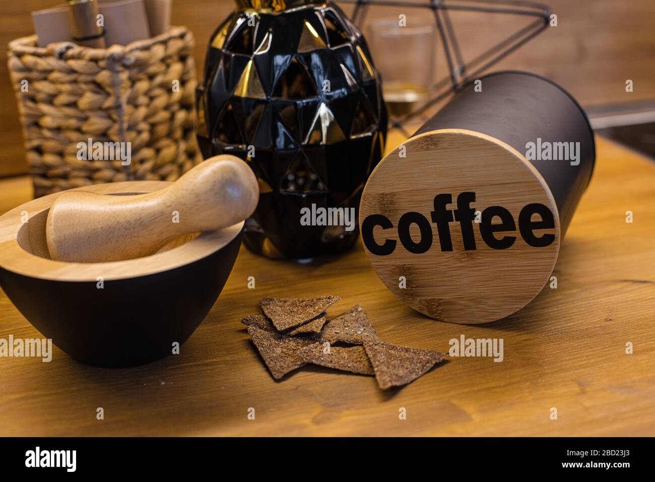 Mortar, pestle and coffee container on table Stock Photo Alamy