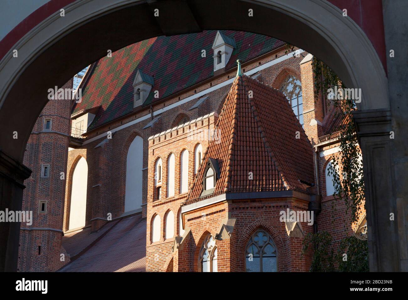 View of St. Elizabeth's Church through archway, Wroclaw, Poland Stock Photo