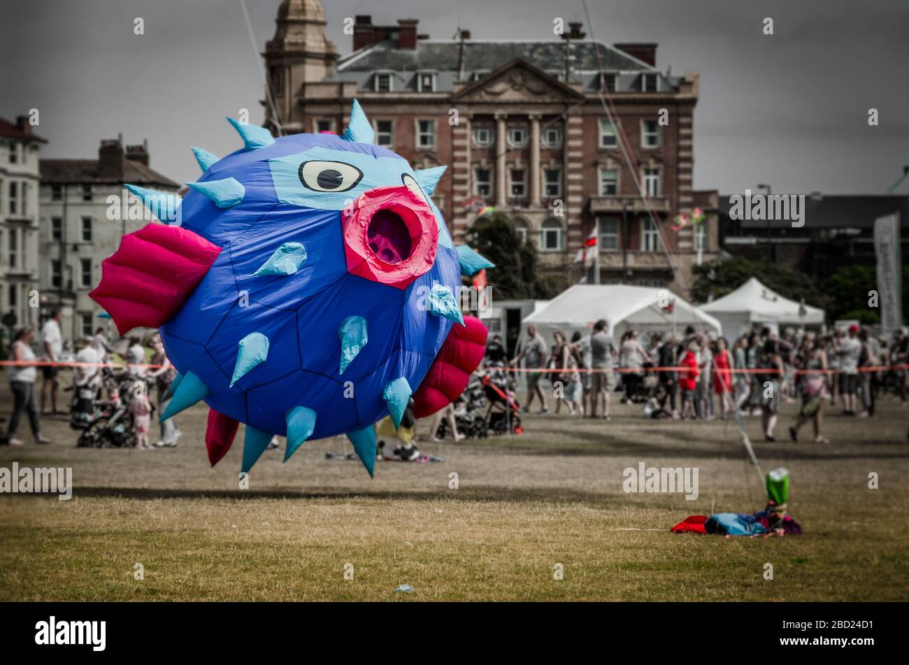 Flying blowfish kite at the Summer Southsea kite festival Event, Portsmouth, UK Stock Photo