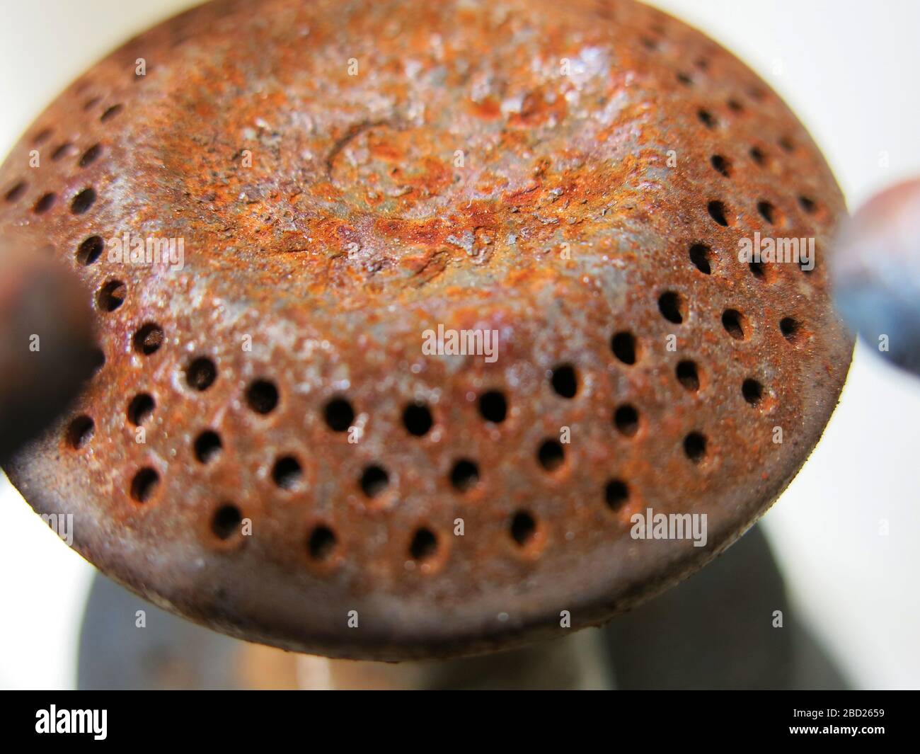 Macro photography of a rusty camping gas burner Stock Photo - Alamy