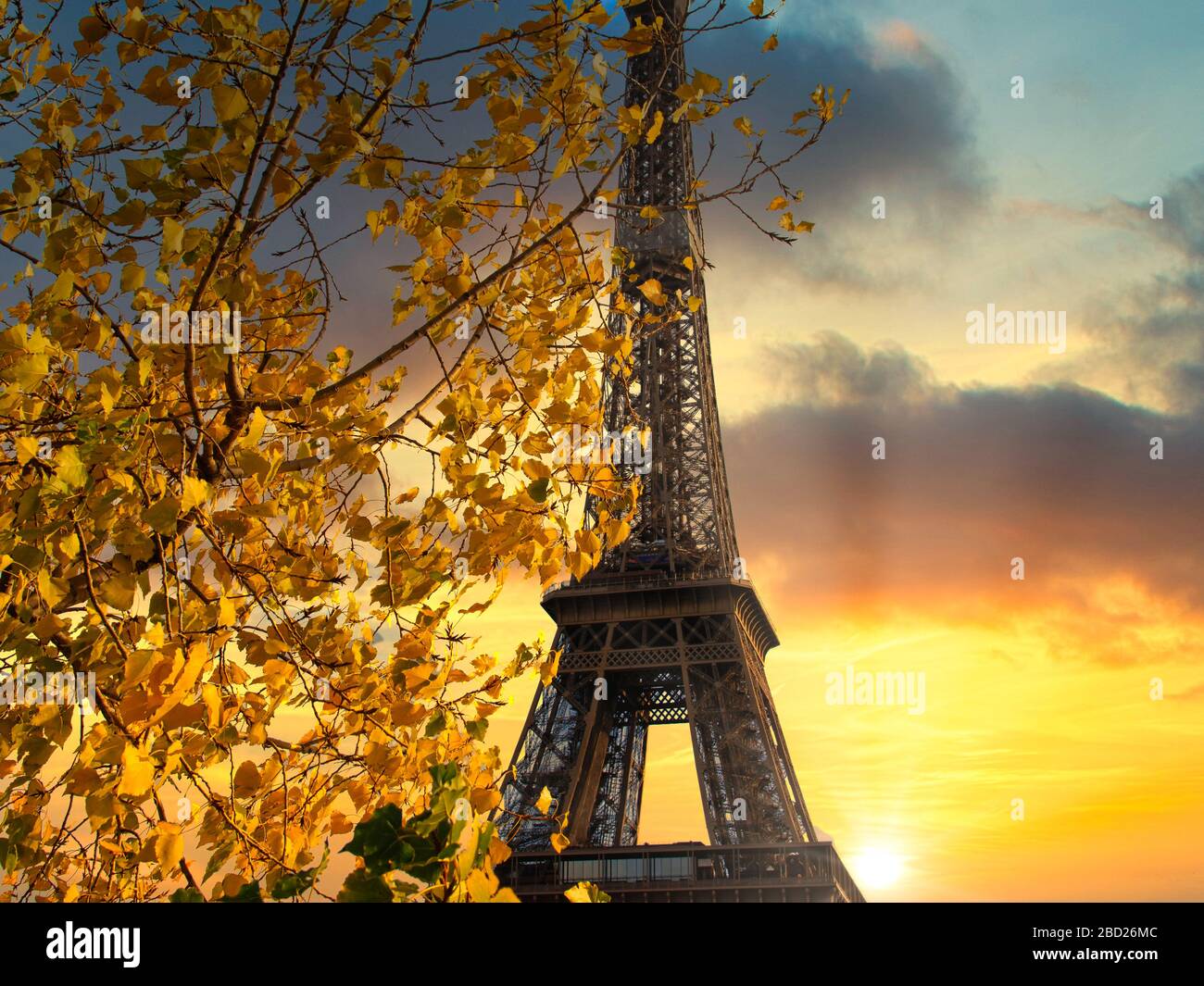 Eiffel tower at sunset in Paris, France Stock Photo