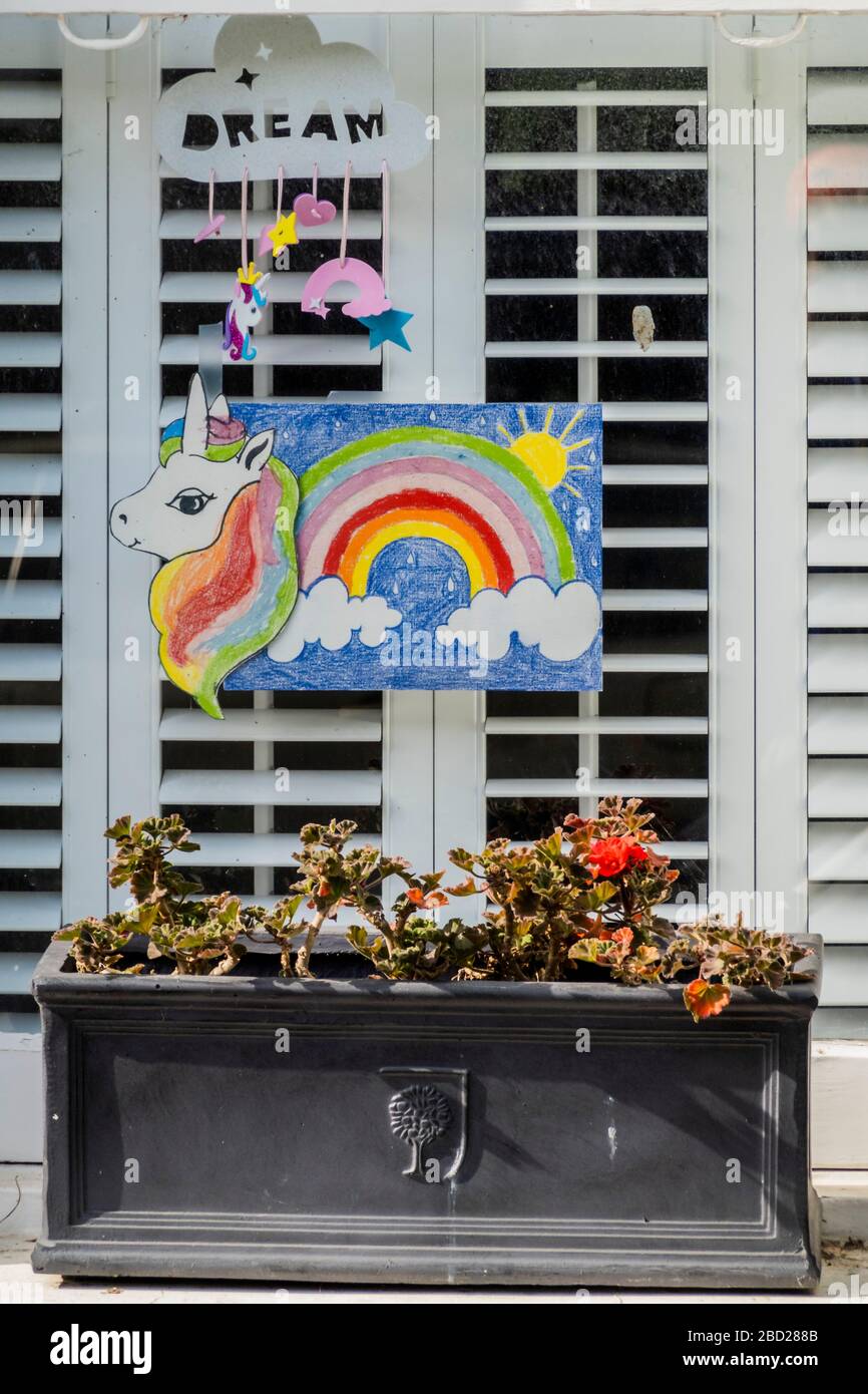 London, UK. 06th April 2020. Rainbow unicorn drawings in windows - A 'symbol of hope' inspired by a drawing (pictured) by Sir Peter Blake, the artist who designed the cover of The Beatles' Sgt. Pepper album. The Evening Standard asked Sir Peter to create his version while he is in self-isolation. The 'lockdown' continues for the Coronavirus (Covid 19) outbreak in London. Credit: Guy Bell/Alamy Live News Credit: Guy Bell/Alamy Live News Stock Photo