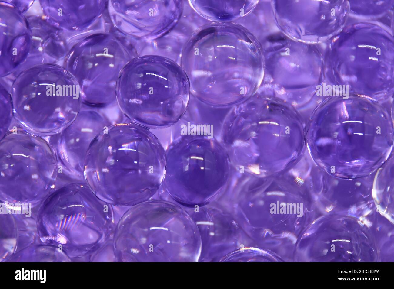 Prurple Object Macro of small purple transparent round circular objects Stock Photo ...