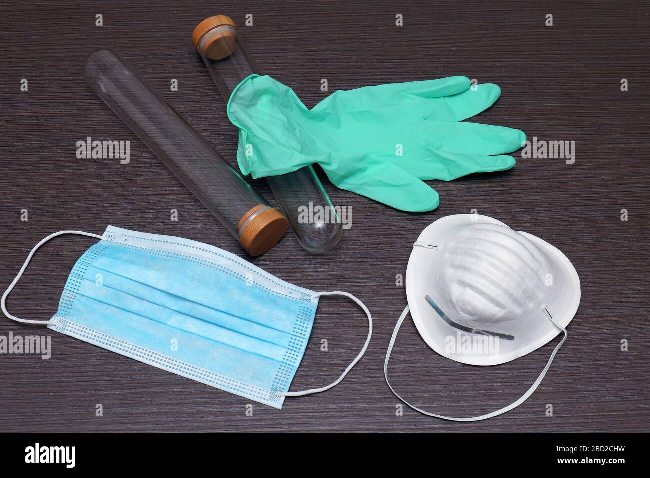 Test tubes and face mask used in medical research laboratory Stock ...