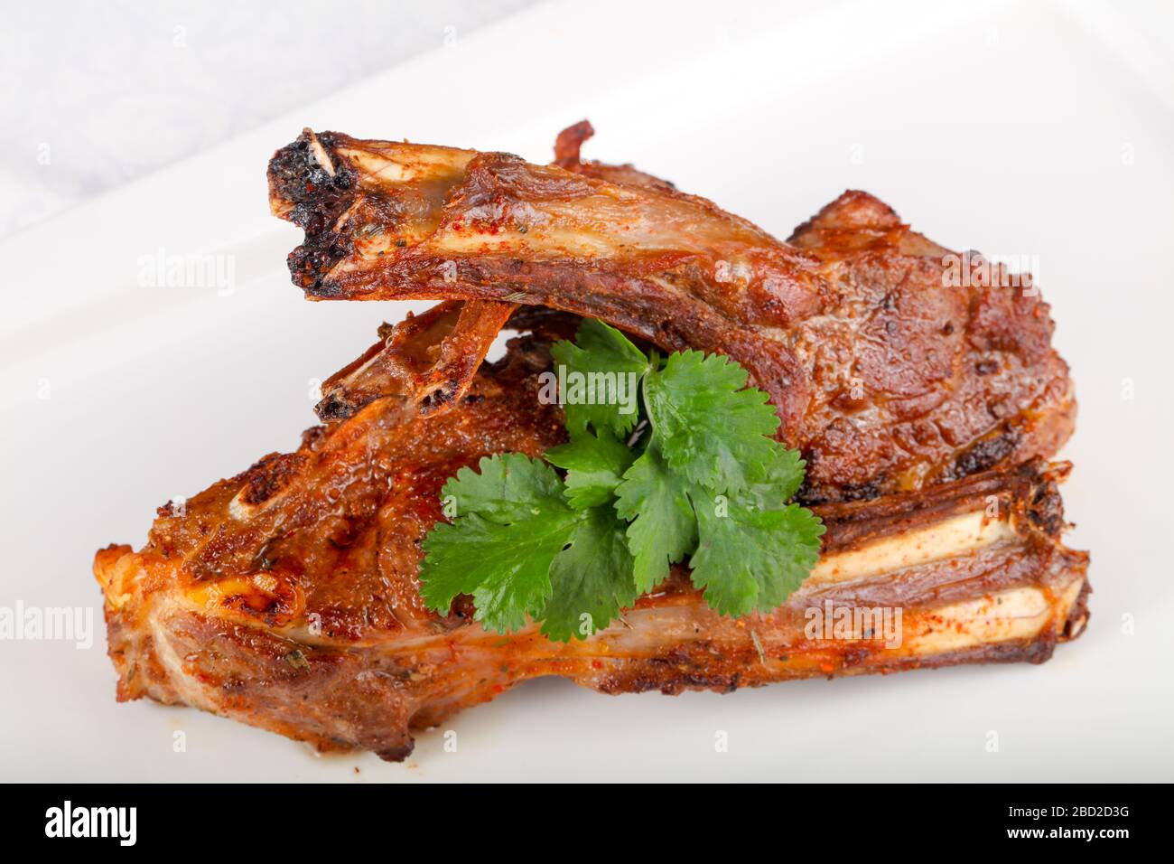 Roasted lamb with coriander leaves Stock Photo Alamy