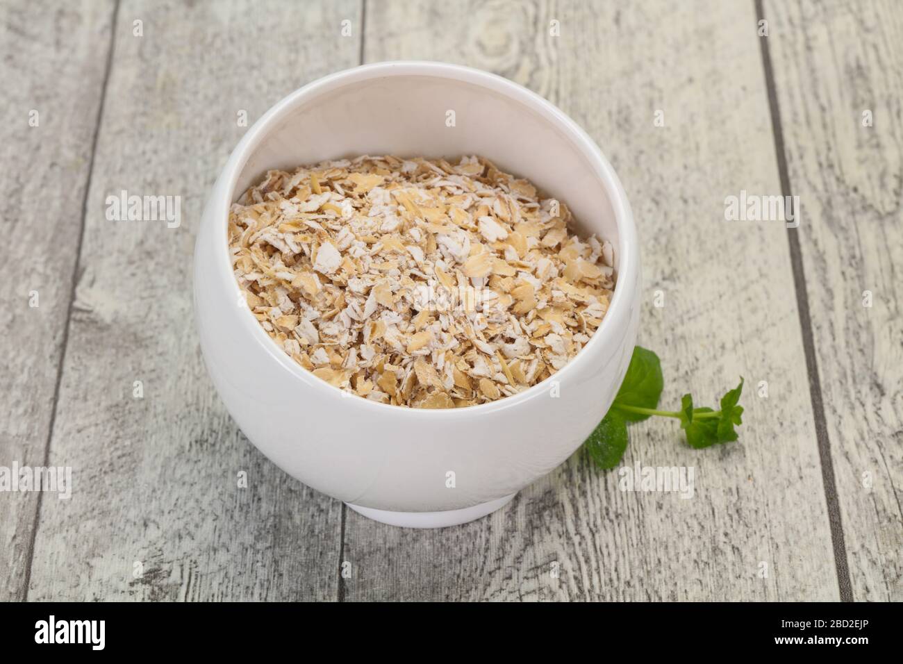 Raw oats in the bowl for breakfast Stock Photo Alamy