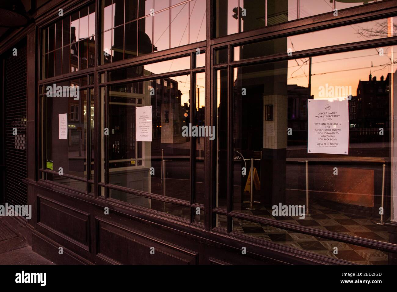 Windows of O'Neills Pub at sunrise in Nottingham City, captured during the Covid-19 crisis in April 2020, Nottinghamshire England UK Stock Photo