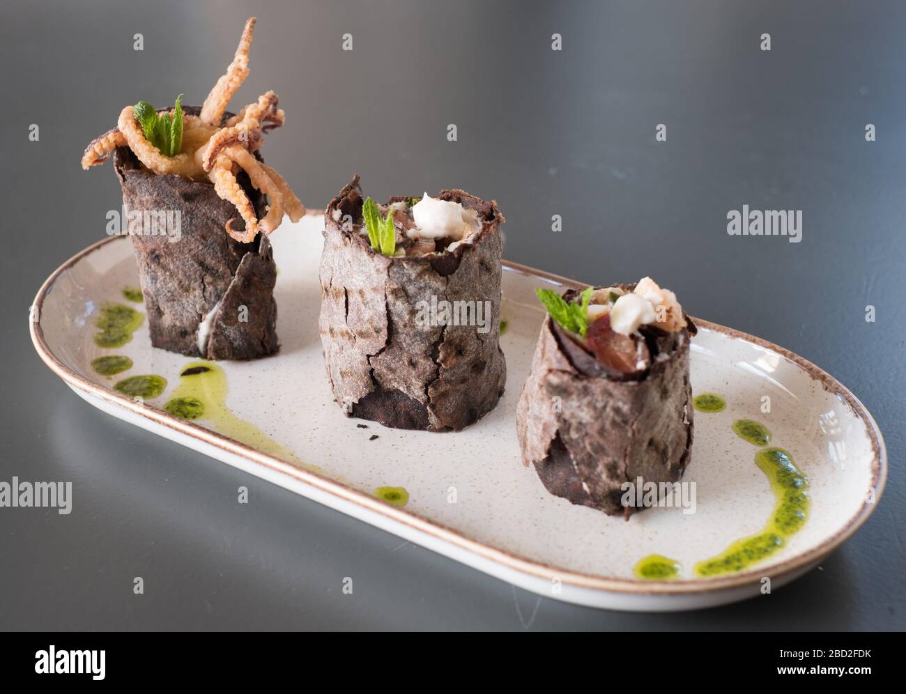 Carob flour seafood wraps at Six Keys restaurant on Greece's Pelion peninsula Stock Photo