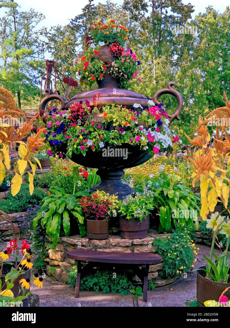 garden scene; large container; colorful flowers; many colors, wood