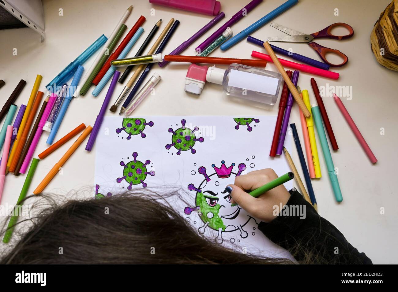 Kids drawing of family and colored pencils on wooden table Stock Photo -  Alamy