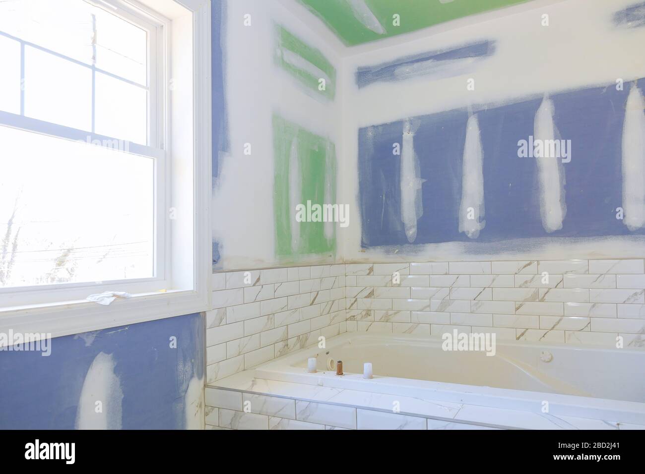 Construction details with Industry renovation shower in tiled bathroom