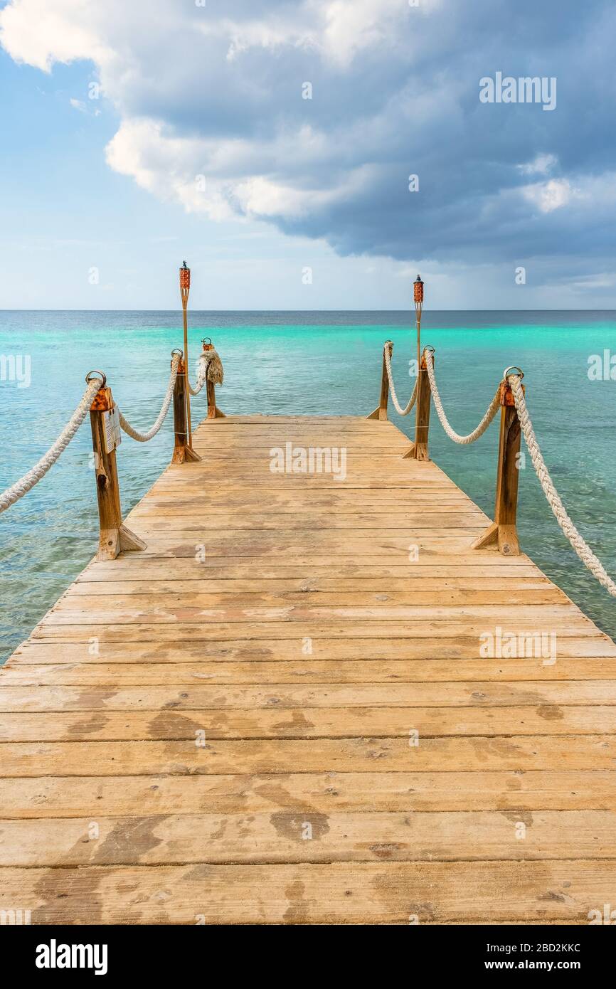 Wooden Pier Into The Sea Stock Photo - Alamy