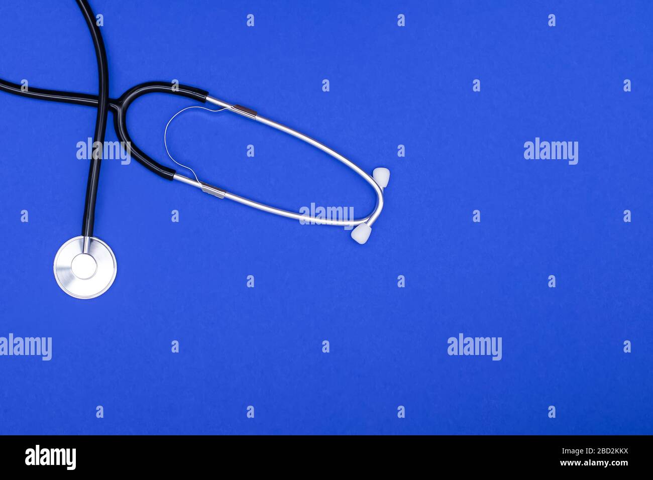 Stethoscope or phonendoscope isolated on blue background. Stock Photo