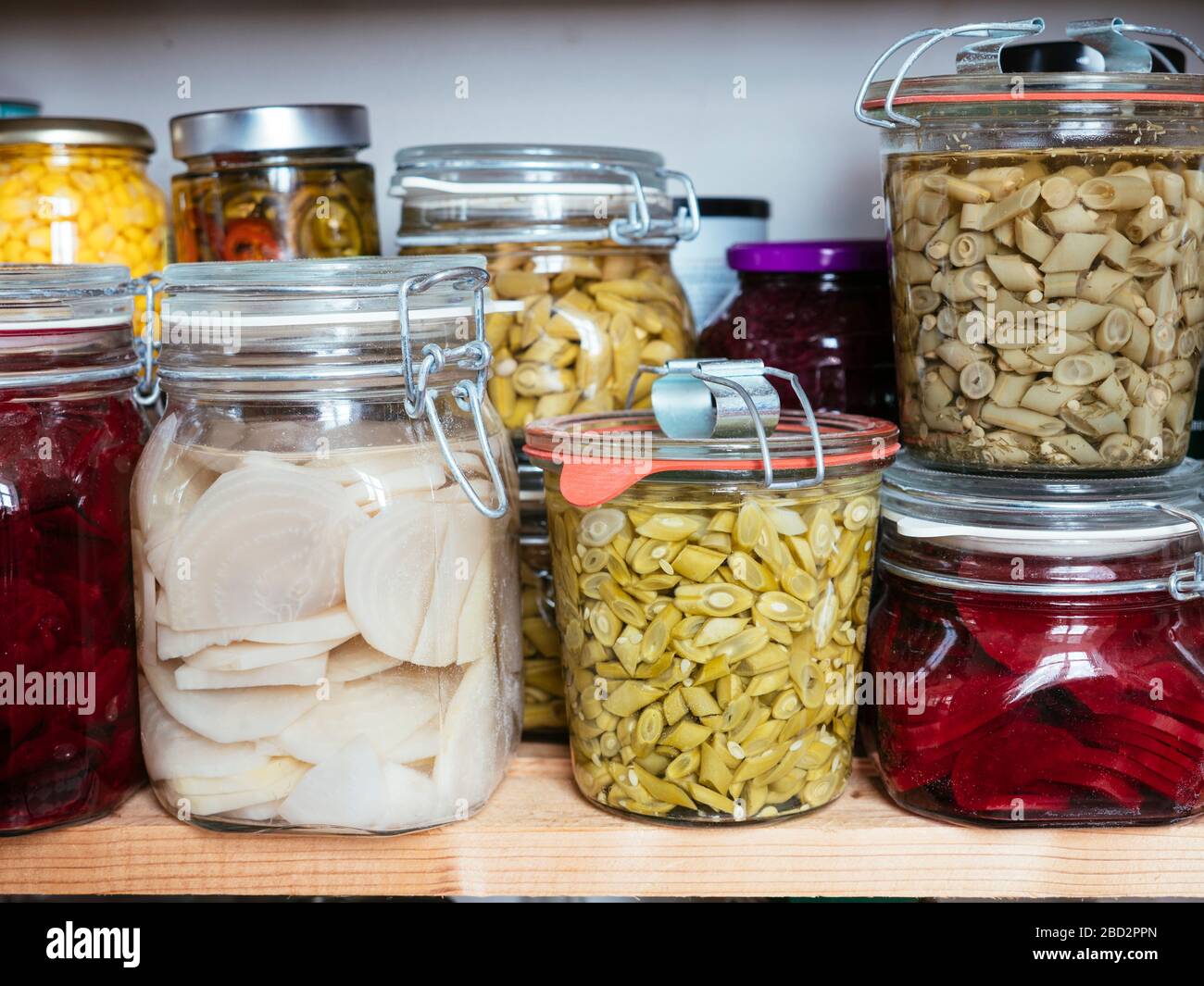 Canned vegetables (beans, beets) in a pantry Stock Photo