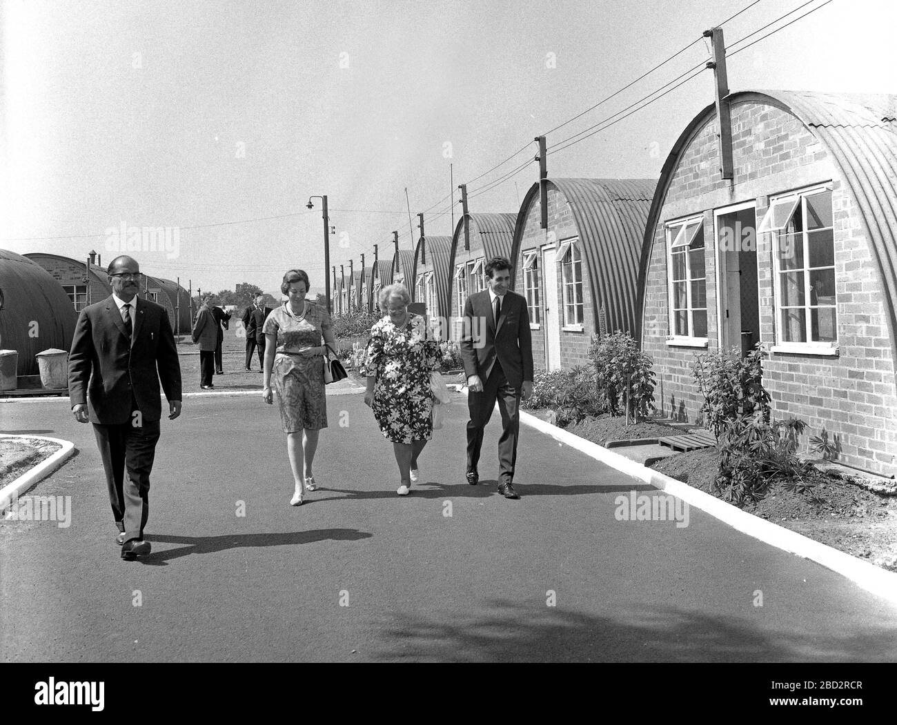 Prince Andreas of Yugoslavia and his wife Princess Kira of Leiningen visiting Serbian Chetniks in displaced persons camp in England Uk 1968. With them is the camp leader Captain Miodrag Krsmanovic (left) Stock Photo