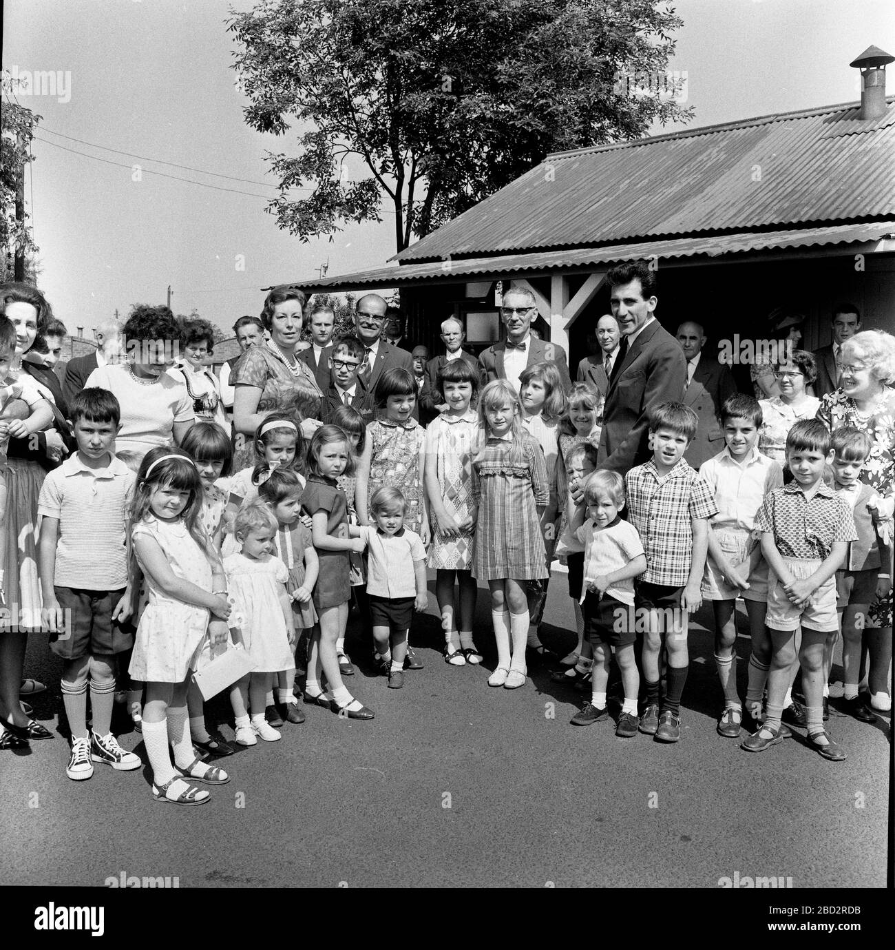 Prince Andreas of Yugoslavia and his wife Princess Kira of Leiningen visiting Serbian Chetniks in displaced persons camp in England Uk 1968. With them is the camp leader Captain Miodrag Krsmanovic Stock Photo