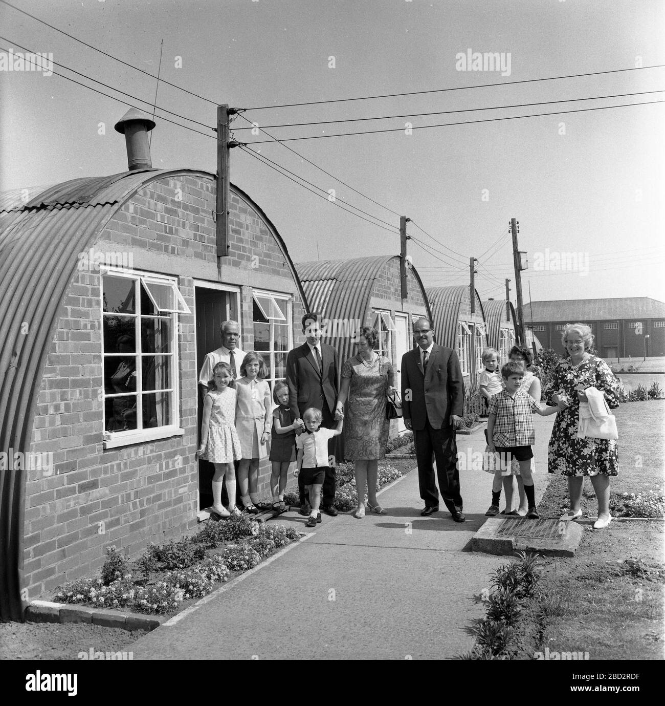 Prince Andreas of Yugoslavia and his wife Princess Kira of Leiningen visiting Serbian Chetniks in displaced persons camp in England Uk 1968. With them is the camp leader Captain Miodrag Krsmanovic Stock Photo