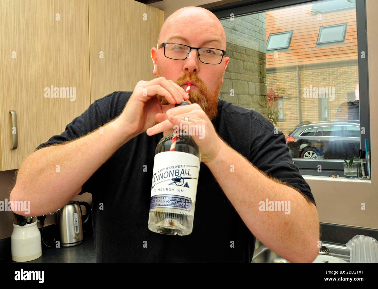 man drinking gin Stock Photo