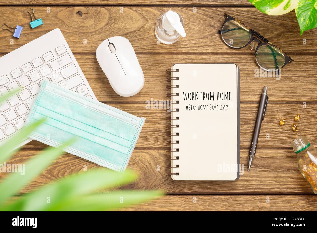 Covid 19 work from home background concept. Pandemic Covid-19 Coronavirus  quarantine concept. Flat lay top view mockup notebook on home office desk  wo Stock Photo - Alamy