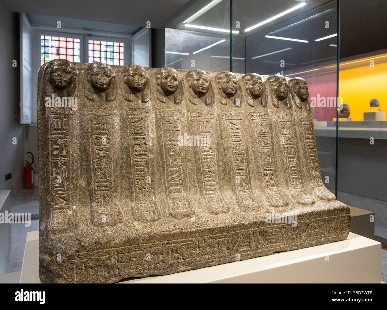 Stone cover of sarcophagus of multiple mummies housed in the National Archaeological Museum in Naples, Italy. Stock Photo
