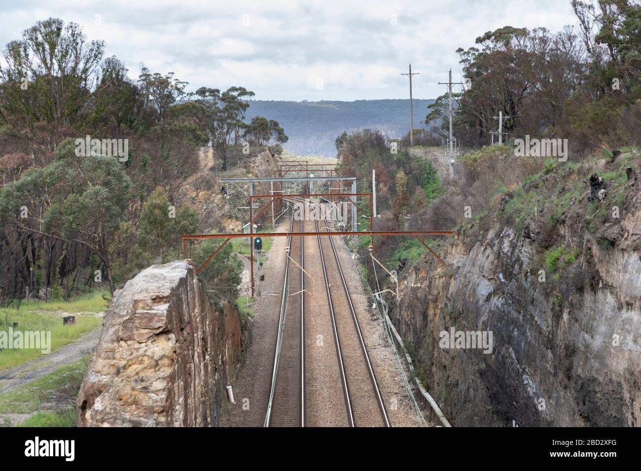 A regional railway line and track in a mountain area Stock Photo