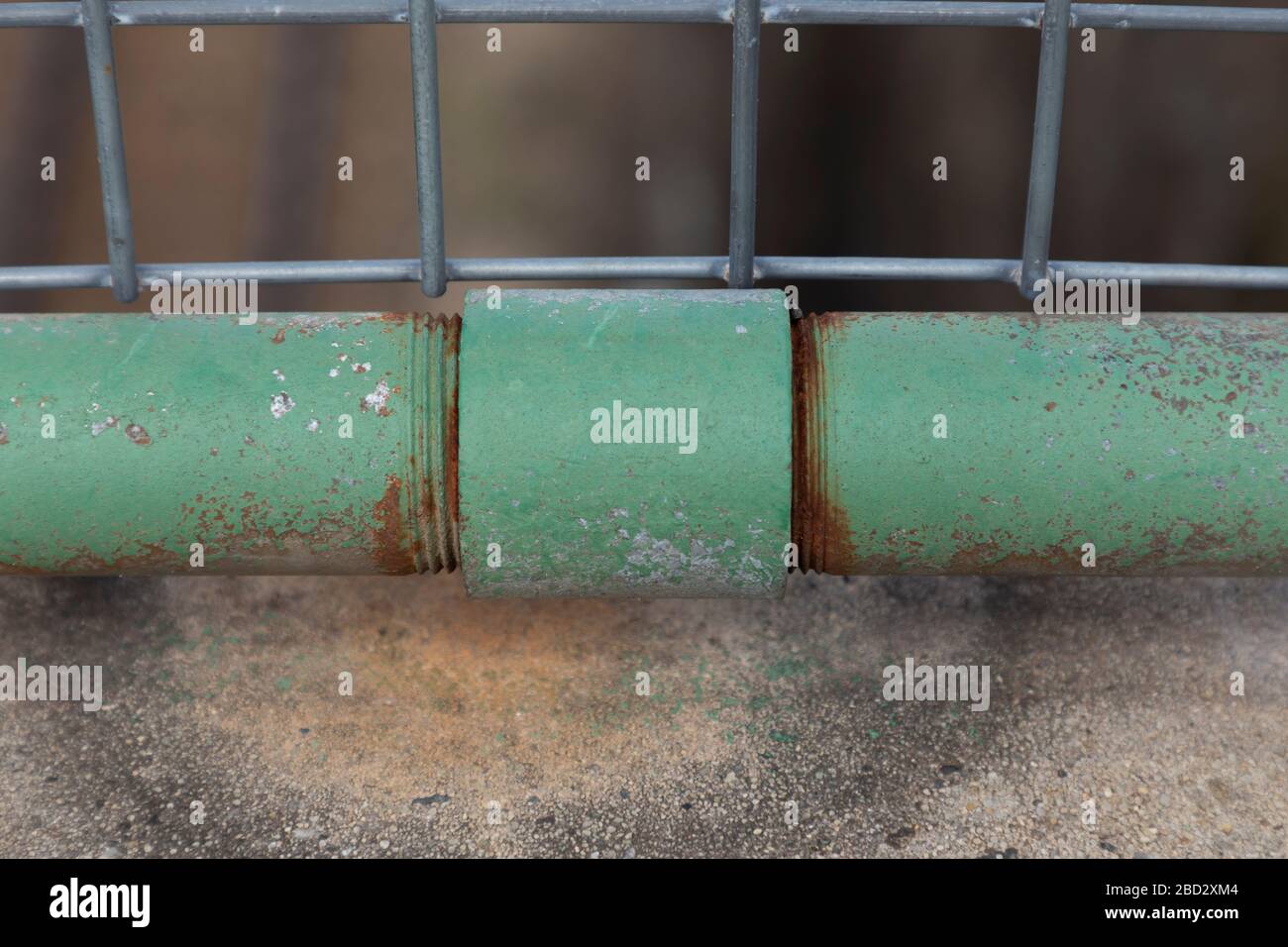 A rusty green steel pipe and threaded connection joint Stock Photo Alamy