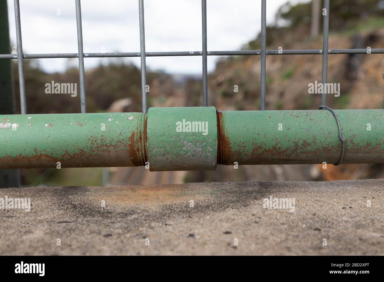 A rusty green steel pipe and threaded connection joint Stock Photo Alamy