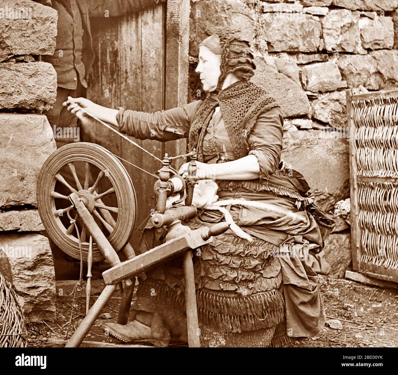 A spinning wheel, Scotland, Victorian period Stock Photo Alamy
