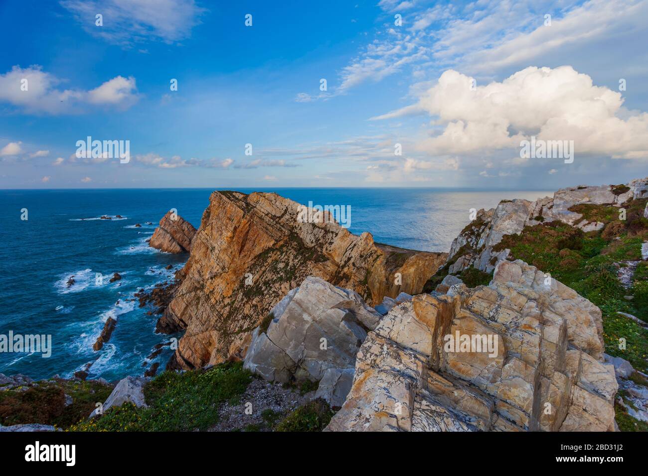 Wide angle view of the cliffs from Cabo de Peñas in a cloudy day. Asturias, Spain. Stock Photo