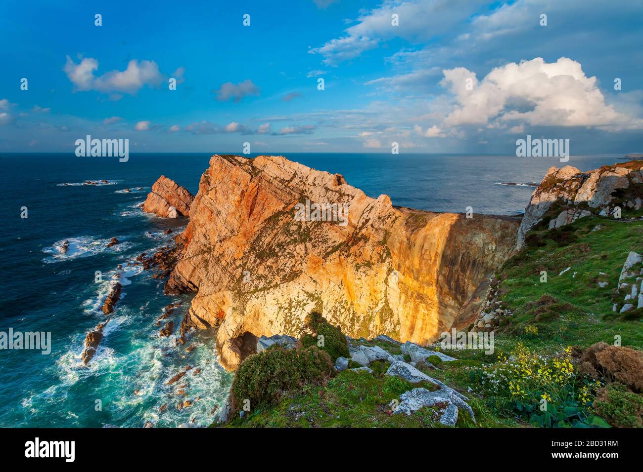 Wide angle view of the cliffs from Cabo de Peñas in a cloudy day. Asturias, Spain. Stock Photo